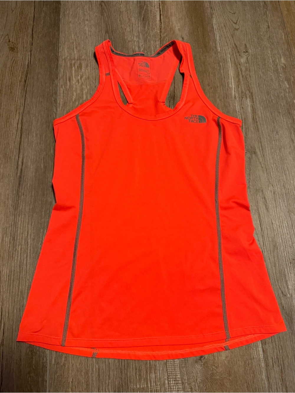 The North Face Women’s Neon Orange Performance Racerback Tank